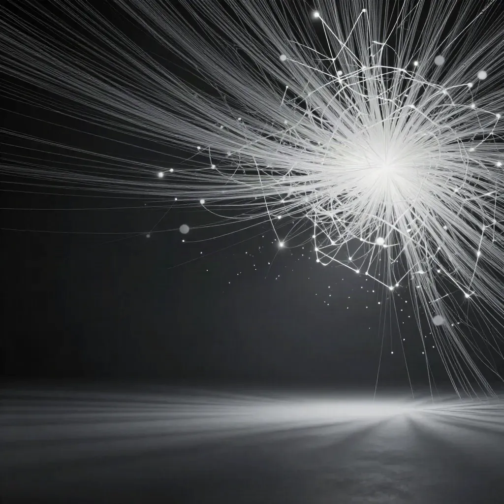 Silver filaments converge into a white bloom in dark graphite space, with calm copy space.